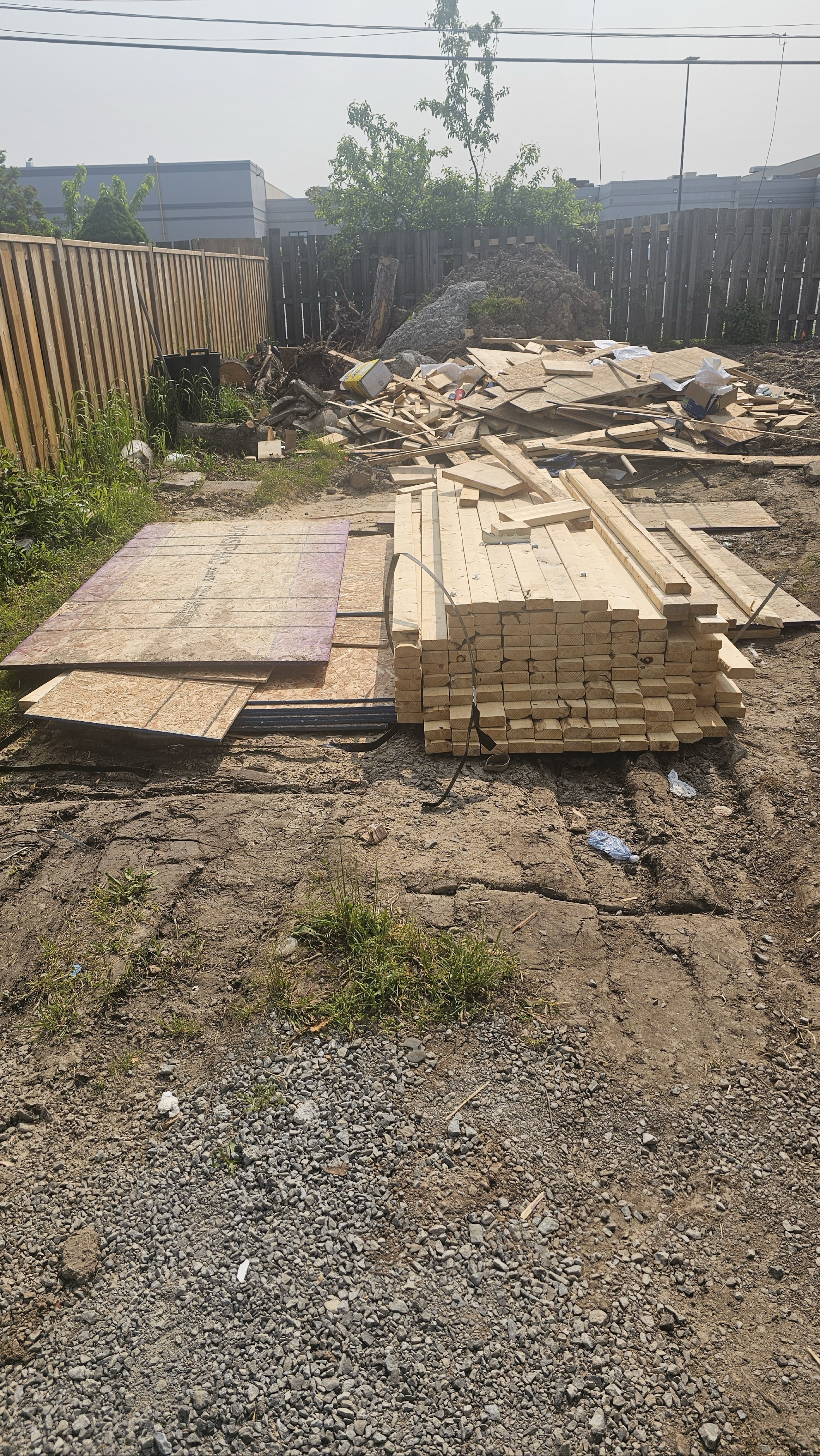 Pile of wood, off-cuts, and dirt before a full clean-up.