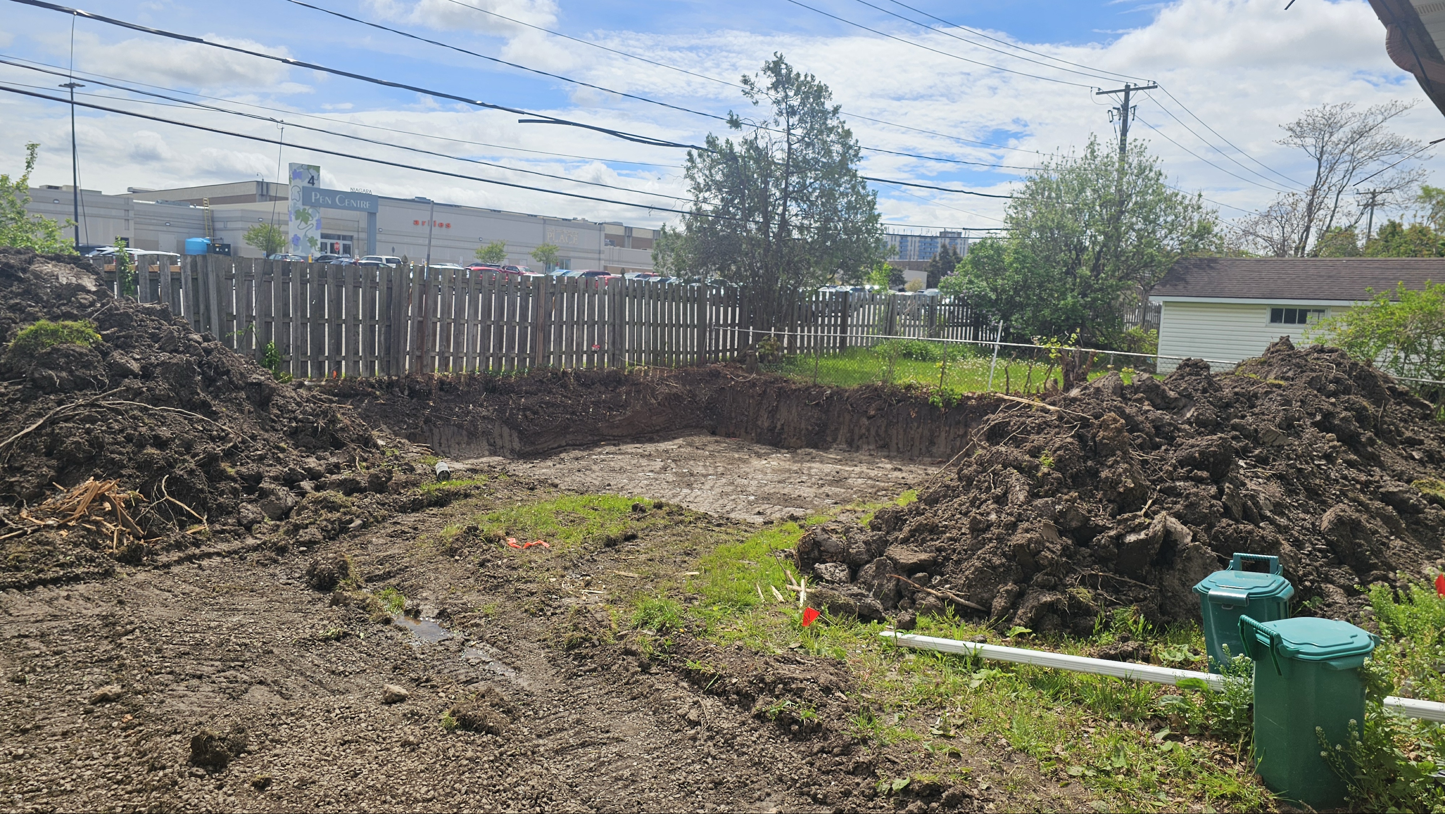 Yard fully dug out at the start of a project.